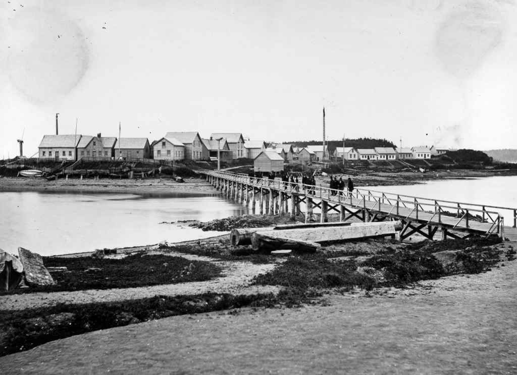 Lax Kw'alaams looking across the bridge to Rose Island. Photo by Edward Dossetter, courtesy of The Bill Reid Centre for Northwest Coast Studies Archive and Lax Kw'alaams