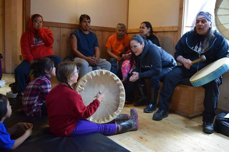 Singing Haida songs at Hiellen Longhouse Village