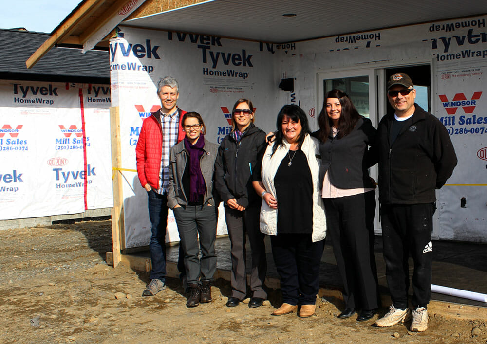Coast Funds staff (from left, Brodie Guy, Meaghan Hume and Robin Poirier) visit during the construction phase of the project in 2015, with (from right) the project’s construction manager, Wei Wai Kum Band Manager Angie Sarsons, and Thunderbird RV Park & Resort Operations Manager Sandra Malone. Photo by Coast Funds.