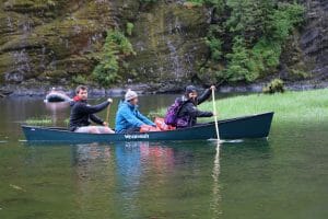Former manager of Spirit Bear Lodge and current resource stewardship advisor, Evan Loveless, in canoe with Kitasoo Guardian Watchmen. Photo by Coast Funds.