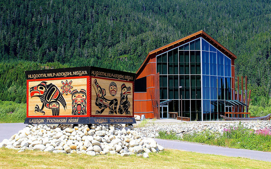 Hli Goothl Wilp-Adokshl Nisga’a (Nisga’a Museum) is a “Class A” museum and features a design inspired by traditional Nisga’a feast dishes, longhouses and canoes. The museum houses cultural treasures acquired in the 19th and early 20th centuries. Photo by Connie Azak, Flickr.