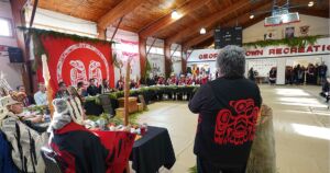 Kilslaay Kaajii Sding (Miles Richardson) speaking to the head table. (Photo: Rhea Botel / Council of the Haida Nation)