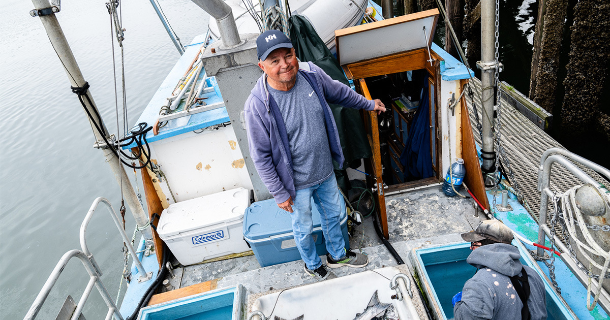 From the deck of the Irenda, Mitch Dudoward offloads his catch at the Aero Trading dock. (Photo: Troy Moth / Coast Funds)